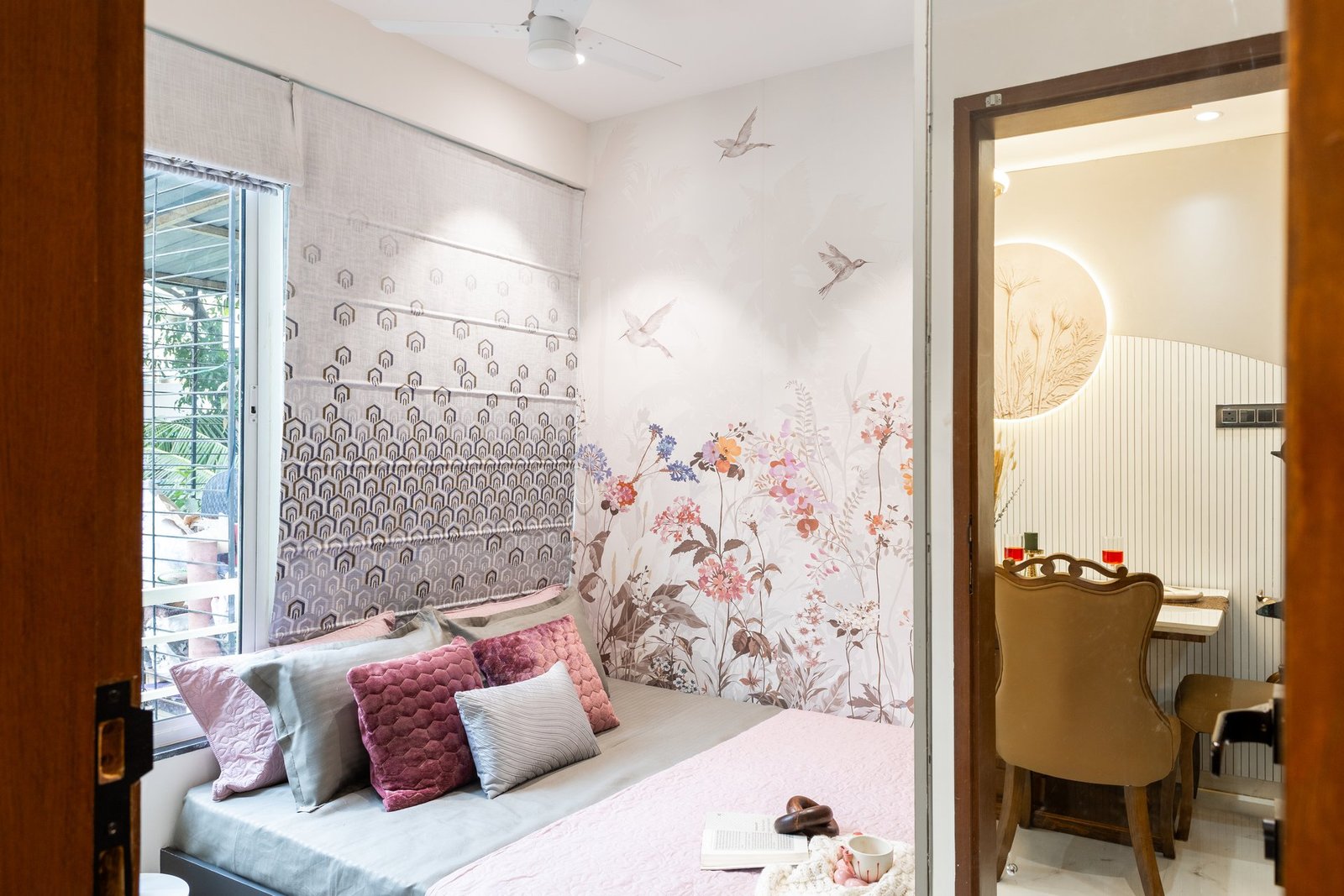 Floral themed guest bedroom with blush pink accents by Design DNA